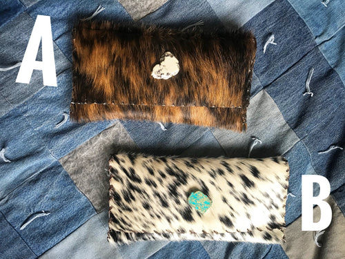 Cowhide Clutch with hand stitched edges
